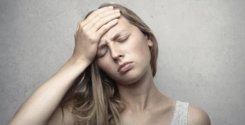 Woman feeling unwell